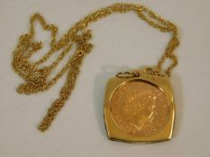 A 9ct mounted 2000 half sovereign with 9ct chain 7