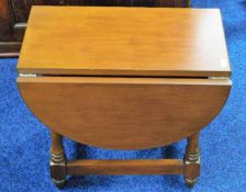 A small drop leaf occasional table