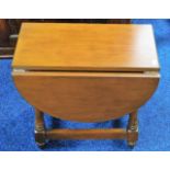 A small drop leaf occasional table