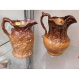 Two stoneware jugs, one with repaired chip, tallest 7.75in