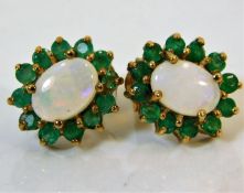 A pair of 9ct gold emerald & opal earrings 1.9g