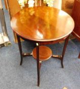 An Edwardian mahogany table 28.5in high x 24in dia