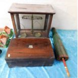 A cased set of balance scales twinned with a rosew