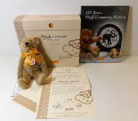 A boxed Steiff Teddy Bear with book