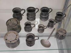 Three pewter inkwells & a selection of other pewte