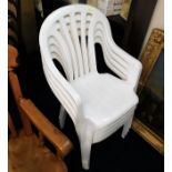 Four plastic garden chairs