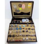 A vintage jewellery box with contents, mostly gent