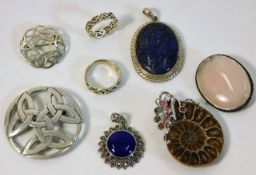 A silver mounted lapis lazuli pendant, a silver mo