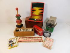 An original Slinky with box & other vintage toys