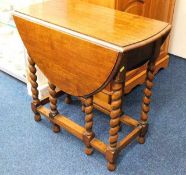 An oak barley twist oak occasional table 41.15in w