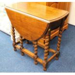 An oak barley twist oak occasional table 41.15in w