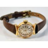 A ladies 18ct gold cased Tissot wrist watch