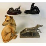 A porcelain sight hound twinned with a spelter fig