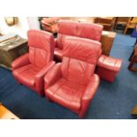 A four piece leather Ekornes Stressless reclining