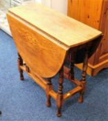 An oak occasional table 41in wide x 29in deep x 26