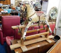 A child's vintage rocking horse 30in tall x 38in l