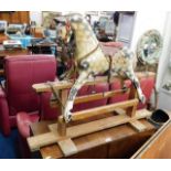 A child's vintage rocking horse 30in tall x 38in l