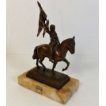 A marble mounted copper figure of French heroine J