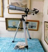 A Celestron telescope with stand