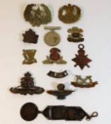 A quantity of cap badges & two medals