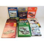 Twelve books relating to cars & motoring including