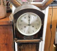 An oak cased grandmother clock, fault to rear door