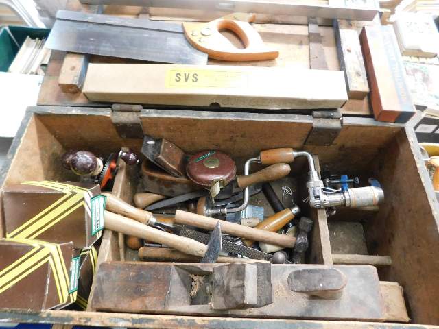 A carpenter's tools box with contents