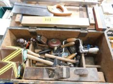 A carpenter's tools box with contents