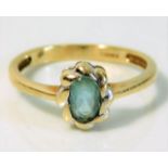 A 9ct gold ring set with topaz 2g size N