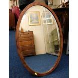 A mahogany framed oval mirror 30in x 19in & one smaller