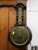 An aneroid barometer with thermometer 18.5in tall