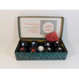 A boxed set of B&A carpet bowls