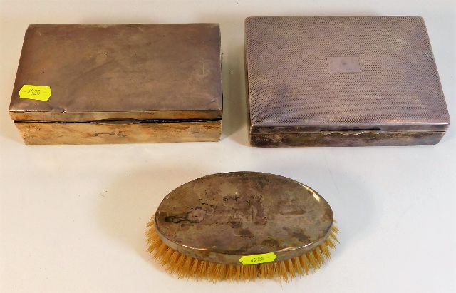 A silver cigar box a/f twinned with a plated cigar