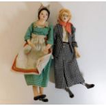 Two model dolls, legs a/f depicting office worker