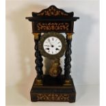 An inlaid French portico clock with twist pillars,