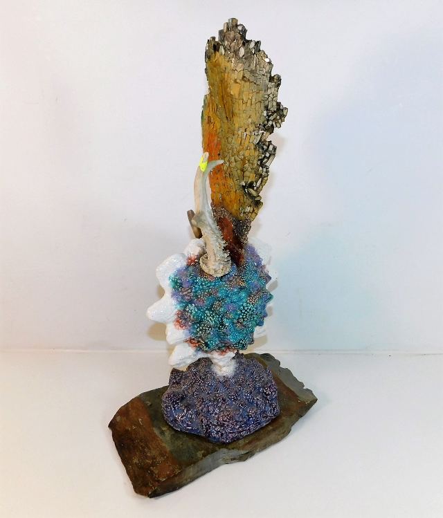 An unusual ceramic & mixed media sculpture (repair