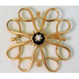 A 9ct gold brooch set with small diamond 2.5g