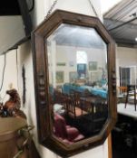 An oak framed mirror 26in high