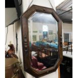 An oak framed mirror 26in high