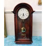 A mahogany cased modern wall clock