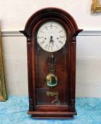 A mahogany cased modern wall clock