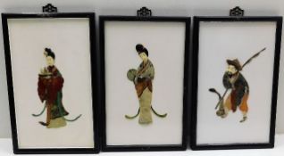 Three Chinese framed relief carved figures