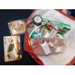 A bagged quantity of mixed items including a dummy