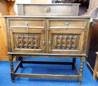 An oak sideboard with two drawers & cupboard 45in