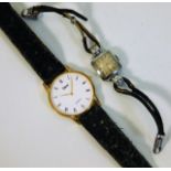 A ladies Tudor wrist watch twinned with a quartz O