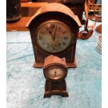 A vintage mantle clock twinned with an artt nouvea