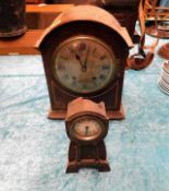 A vintage mantle clock twinned with an artt nouvea