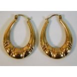 A pair of 9ct gold drop hoop earrings 2.8g