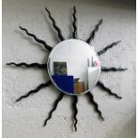 A Sunburst metal framed mirror