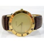 A gents gold plated Gucci 3000 2m wrist watch, som